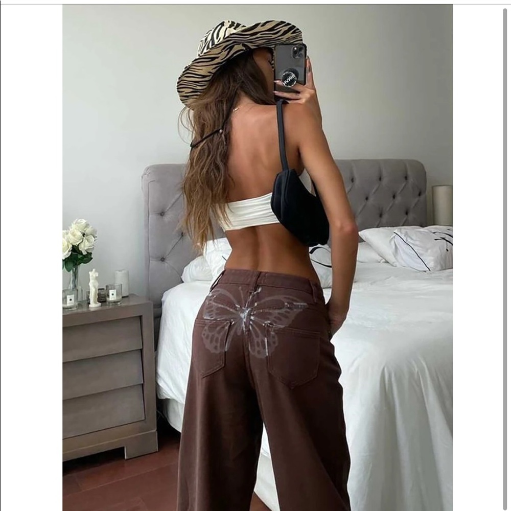 Brown butterfly jeans